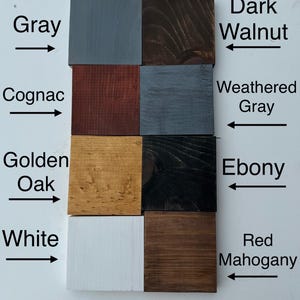 May include: Wood stain colour samples in various shades of brown, grey, and white. The colours are labelled: Grey, Cognac, Golden Oak, White, Dark Walnut, Weathered Grey, Ebony, and Red Mahogany.
