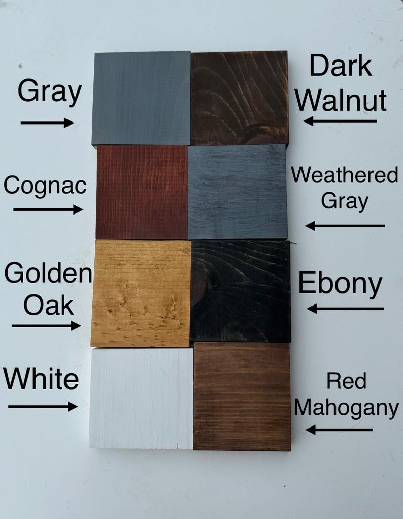 May include: Wood stain colour samples in various shades of brown, grey, and white. The colours are labelled: Grey, Cognac, Golden Oak, White, Dark Walnut, Weathered Grey, Ebony, and Red Mahogany.