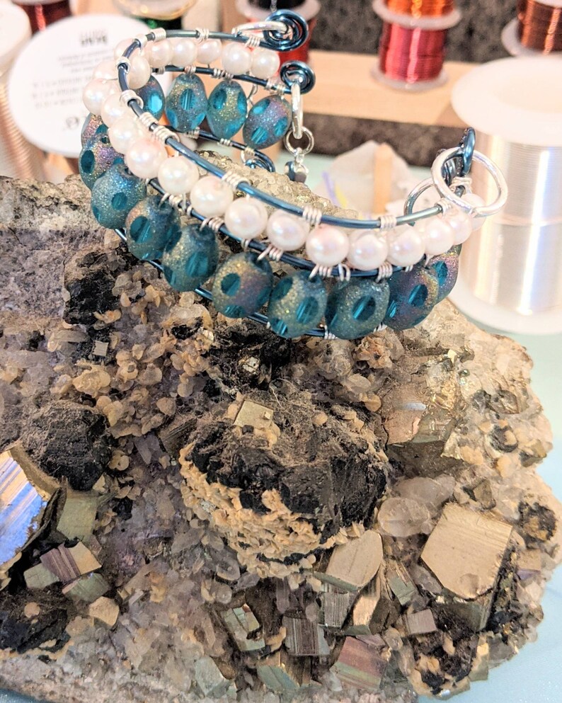 wire wrap beaded bangle bracelet Blue bangle With safety chains. wire wrap bangle