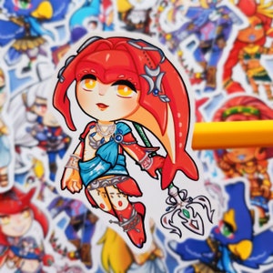 May include: A sticker featuring a cartoon character with red hair, a blue and white outfit, and a spear. The character is holding a spear and has a yellow and blue background.