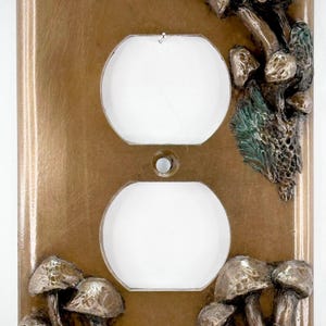 Tapa de salida tipo hongo