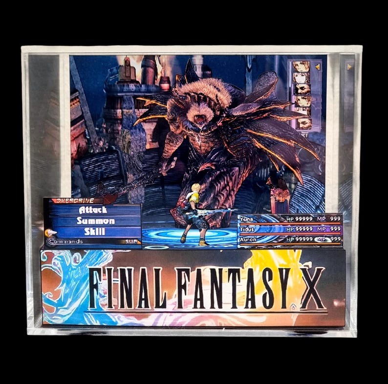 May include: A framed artwork featuring a scene from Final Fantasy X. The image shows a character in battle with a large monster, with game interface elements visible. The title "FINAL FANTASY X" is displayed at the bottom.