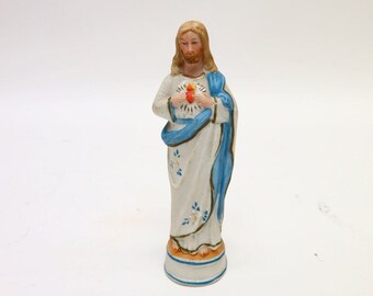 Antique porcelain Christ statue