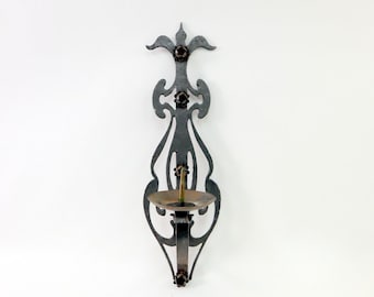 Wrought iron wall sconce