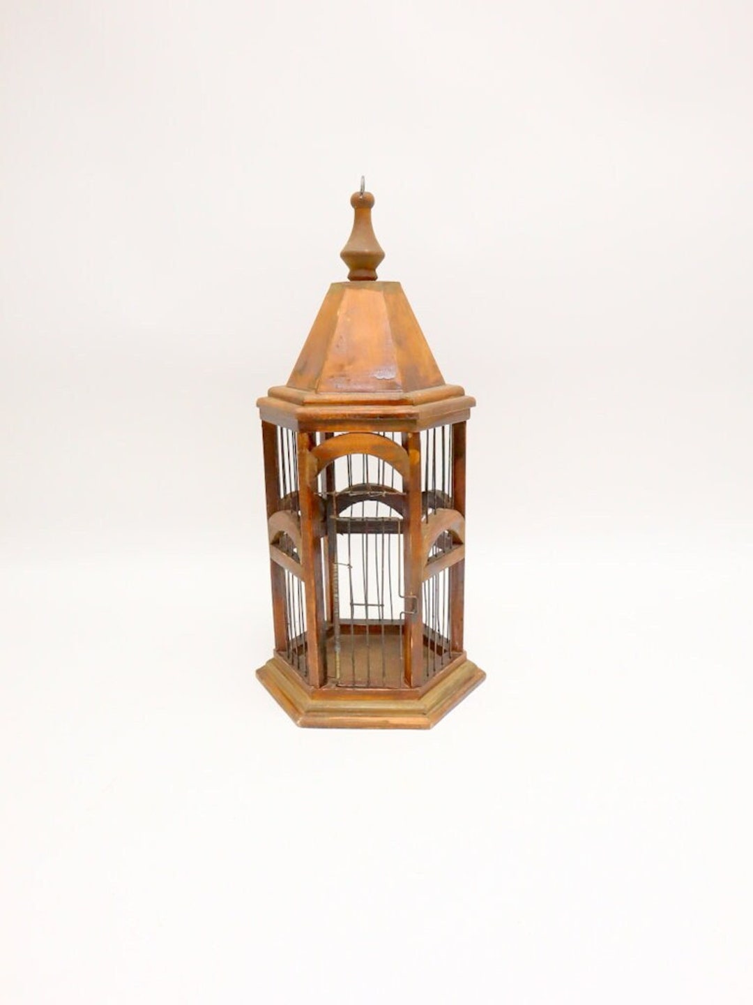 Photo inspiration: Fresh Look at Antique Wooden Birdcage With Iron Bars