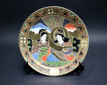 Antique Chinese Satsuma plate. Stamped on the bottom.