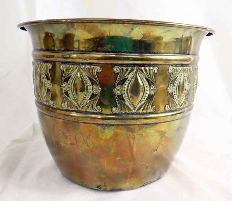 Three antique copper flower pots with handbeaten decorations. Etsy