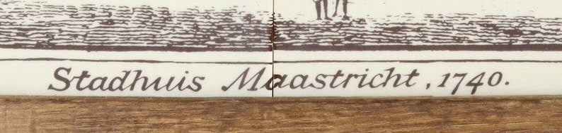Tile panel with 4 ceramic tiles in a wooden frame.
