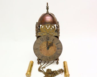 Antiguo reloj farol de cobre "John Smith London"