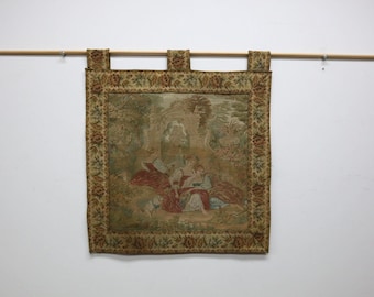 Antique Gobelin tapestry with a romantic garden scene. Origin France.