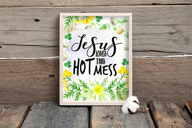 Puede incluir: Una impresi&oacute;n enmarcada con un dise&ntilde;o floral de acuarela y el texto "Jesus loves this hot mess".