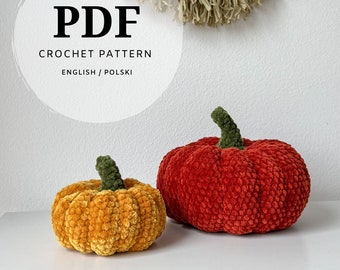 May include: PDF crochet pattern for two pumpkins, one orange and one red, with a textured surface. The pattern is available in English and Polish.