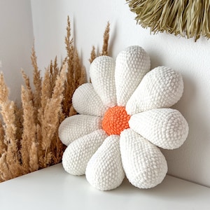 a crochet pattern for a large daisy pillow fits the boho bedroom of a room not only for a child, the amigurumi method spring flower motif image 7