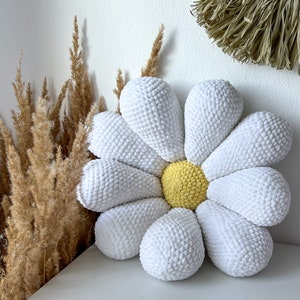 a crochet pattern for a large daisy pillow fits the boho bedroom of a room not only for a child, the amigurumi method spring flower motif image 6