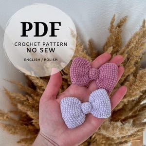 May include: PDF crochet pattern for a no-sew bow, available in English and Polish. The image shows two crocheted bows, one in pink and one in lavender.