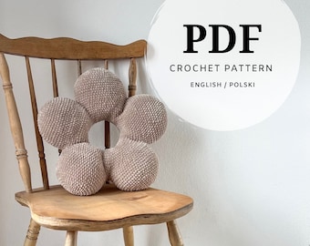 crochet pattern for a completely different flower-shaped pillow with a gap, a modern complement to any interior, boho children's room