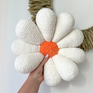 a crochet pattern for a large daisy pillow fits the boho bedroom of a room not only for a child, the amigurumi method spring flower motif image 8