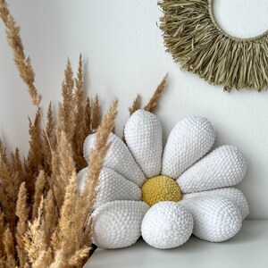 a crochet pattern for a large daisy pillow fits the boho bedroom of a room not only for a child, the amigurumi method spring flower motif image 2