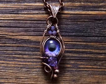 Collier globe oculaire violet : bijoux du troisième œil enveloppés de fil de cuivre