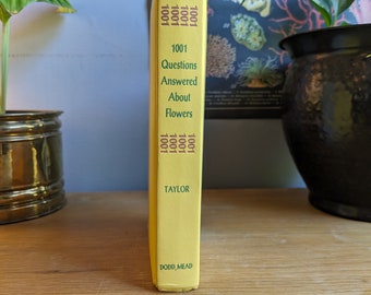 1001 questions répondues sur les fleurs (1963), livre relié par Norman Taylor