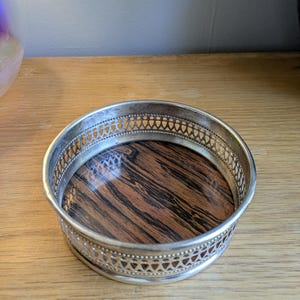 Vintage MCM silver-plated bottle coaster