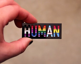 HUMAN ENAMEL PIN, lgbtqia/queer flags by Skyler Orion X