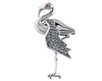 May include: A silver flamingo brooch with a red gemstone eye and a marquetry design.