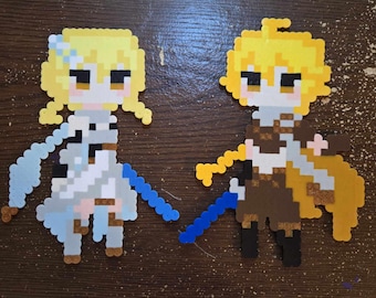 May include: Two pixel art figures made of colorful beads. The figures are a yellow-haired female with a blue and white dress and a yellow-haired male with a brown and yellow outfit.