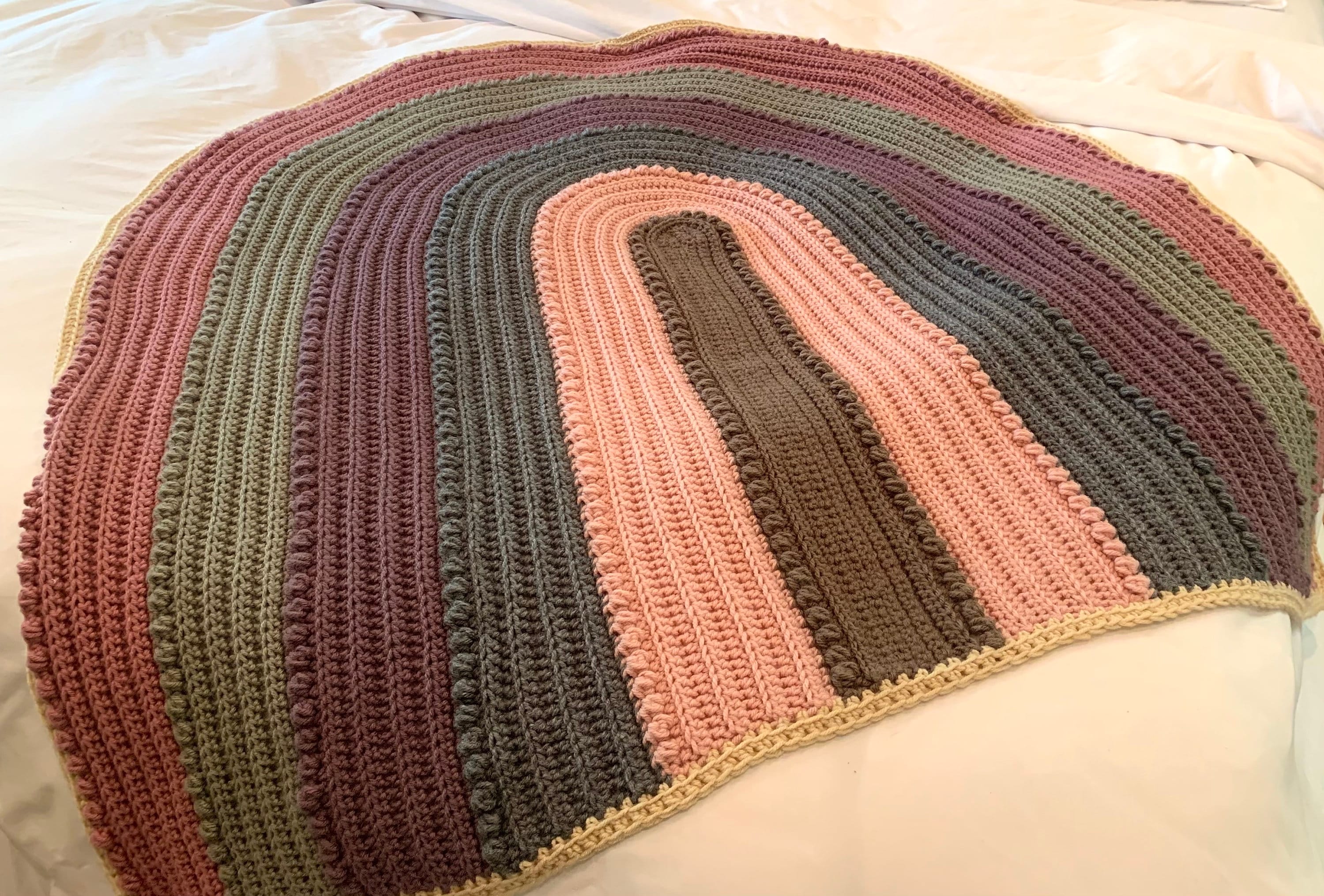 30 Rainbow Blanket Crochet Patterns to Brighten Baby Rooms, Throws, and Gift Giving 2 Piper Rainbow Blanket Crochet Pattern
