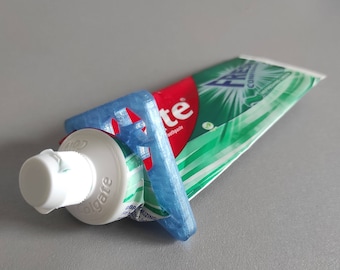 Set mit zwei ECO-Zahnpasta-Ausdrückern. Zahnpasta-Ausdrücker aus recycelten Flaschen