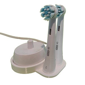 Oral-b iO 6 and below stand for charger and 2 toothbrush heads