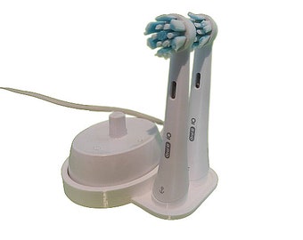 Oral-b iO 6 and below stand for charger and 2 toothbrush heads