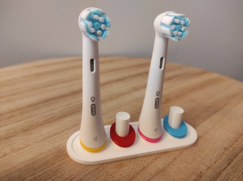 Oral-b iO Ständer für Zahnbürstenköpfe mit Farbringen Bild 1