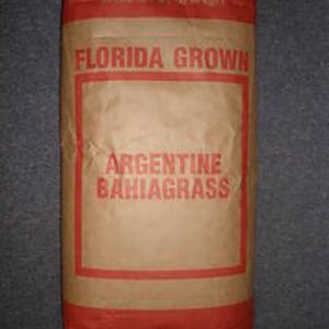 May include: A brown paper bag with red trim and the text "FLORIDA GROWN ARGENTINE BAHIAGRASS" printed on it.