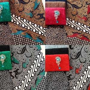 May include: A collage of four images showing different fabric patterns. Each image features a small square of fabric with a decorative brooch in the center. The brooches are all different colors and designs. The fabric patterns are all different, but they all have a similar style. The fabric is a traditional Indonesian batik.