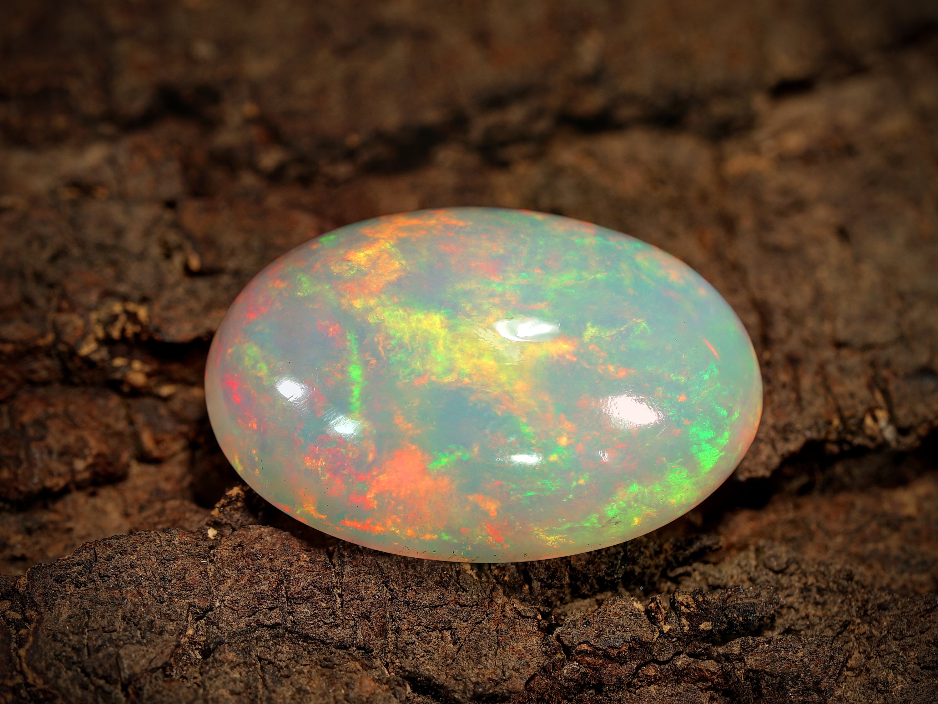 Natural Beautiful Ethiopian Welo Fire Opal Multi-Fire Oval Cabochon Gemstone . Natural Beautiful Ethiopian Welo Fire Opal Multi-Fire Oval Cabochon Gemstone .