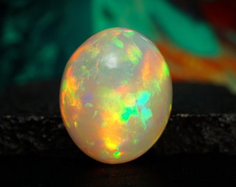 AAA Grade Natural Ethiopian Welo Opal – White Rainbow Fire – Oval Cabochon