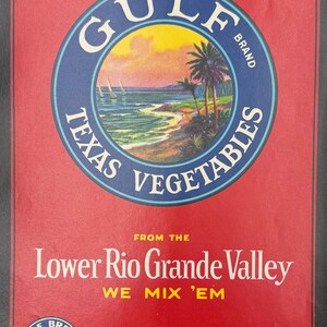 May include: Vintage Gulf Brand Texas Vegetables label. The label features a circular image of a beach scene with palm trees and sailboats, set against a sunset. Text includes "Lower Rio Grande Valley" and "We Mix 'Em."
