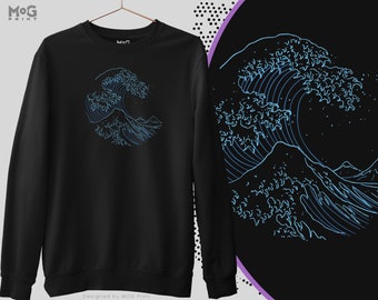 May include: Black sweatshirt with a blue line drawing of a large wave, similar to the Great Wave off Kanagawa, on the front. The text "Designed by MOG Print" is at the bottom of the sweatshirt.