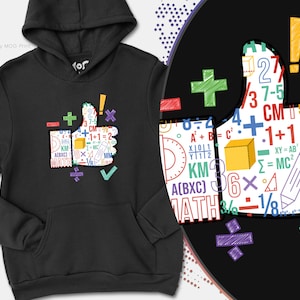 Op de afbeelding: Zwarte hoodie met een kleurrijke afbeelding van een duim omhoog met wiskundige symbolen en vergelijkingen. De afbeelding bevat getallen, letters en symbolen zoals plus, min, vermenigvuldiging, deling en gelijkteken.