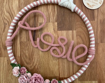 Blush pink name hoop with rose details.