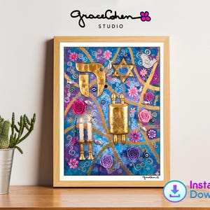 May include: A framed artwork with a blue, purple, and gold background. The artwork features a gold Hebrew letter, a Star of David, a Torah scroll, and floral accents. The frame is a light wood color. The artwork is labeled "Grace Cohen Studio".