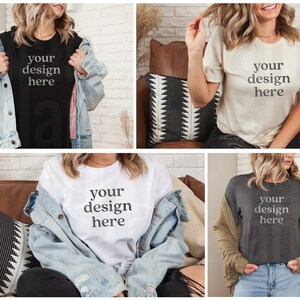 May include: Four different color t-shirts with the text "your design here" printed on the front. The t-shirts are shown on models wearing jeans and jackets.