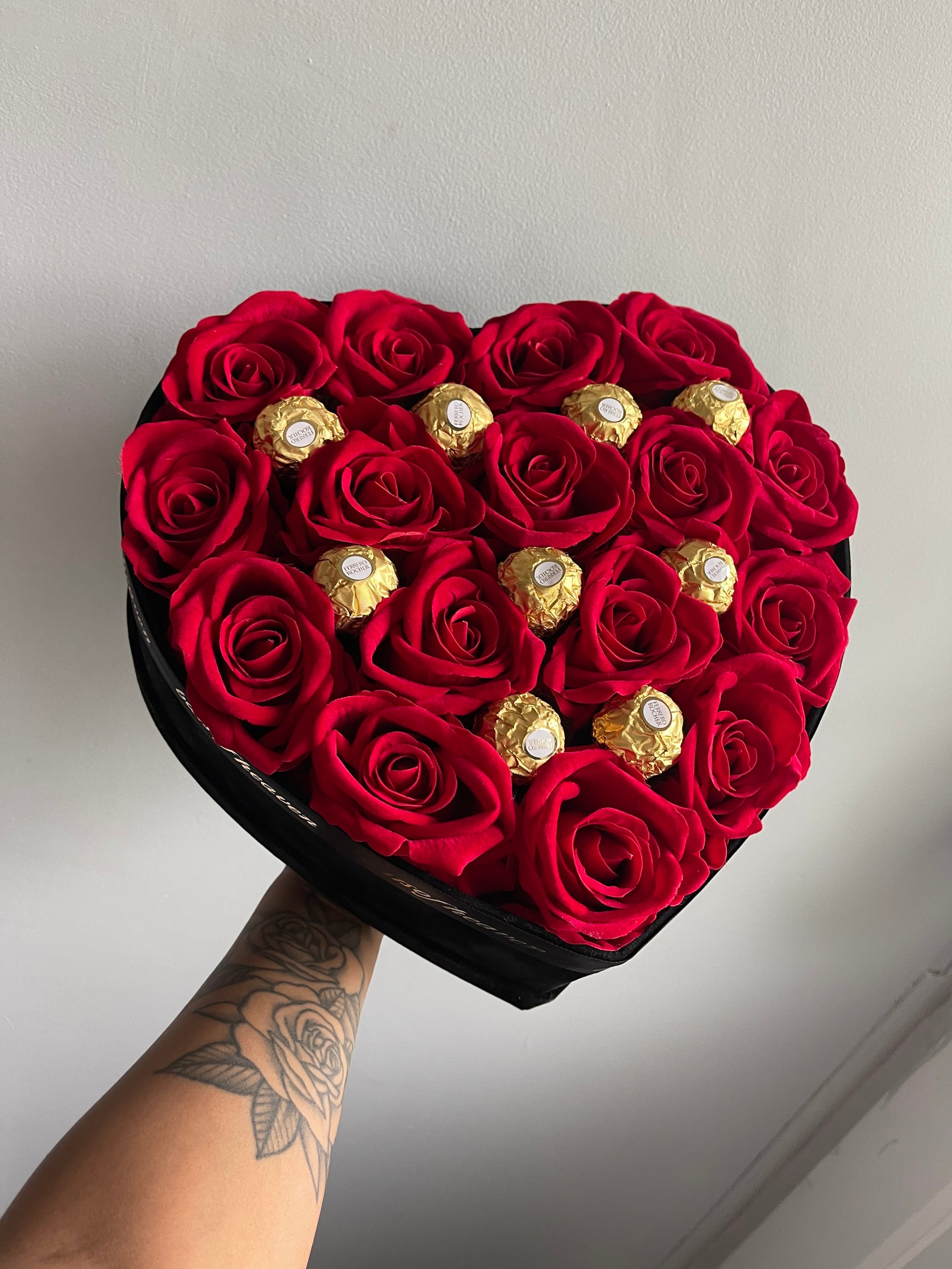 Luxurious pink and red roses in heart shaped box.Valentine's day flowers.  Flowers. Anniversary flowers. Birthday flowers. Valentine's day gifts.  Bespoke flower arrangements. Cute gifts for her. Luxurious flowers.Red roses.  100 red roses.
