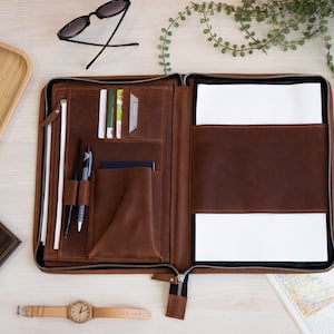 Portafolio de cuero personalizado con cremallera, portafolios comerciales grabados a medida para profesionales