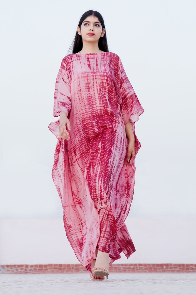 The KOSH Aloe Kaftan, featuring Shibori, a dyeing technique, transforms into a serene lullaby, offering comfort and mordernity. image 2