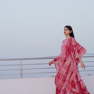 The KOSH Aloe Kaftan, featuring Shibori, a dyeing technique, transforms into a serene lullaby, offering comfort and mordernity. image 4