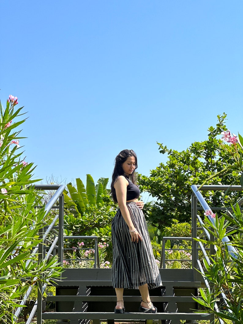 The Breeze Skirt is a handwoven summer garment from Fulia, handwoven cotton, featuring pocket and flowing length for effortless movement. image 7