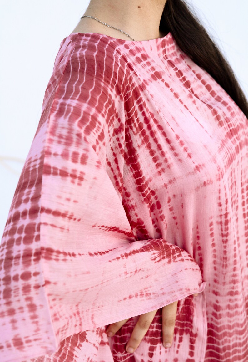 The KOSH Aloe Kaftan, featuring Shibori, a dyeing technique, transforms into a serene lullaby, offering comfort and mordernity. image 9