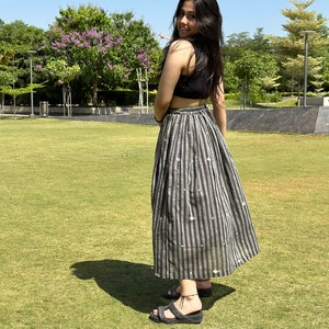 The Breeze Skirt is a handwoven summer garment from Fulia, handwoven cotton, featuring pocket and flowing length for effortless movement. image 3
